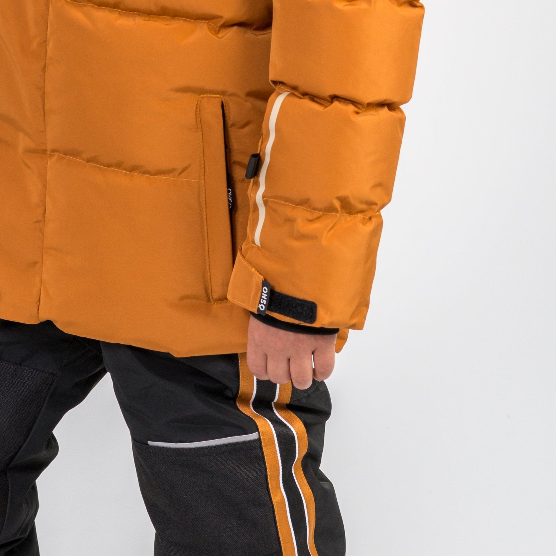 Luca's Luxury boys snowsuit with sleek design by Junior Kids