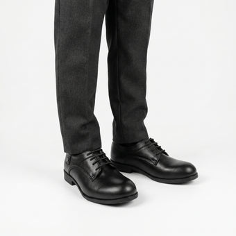 Les chaussures de Tino
