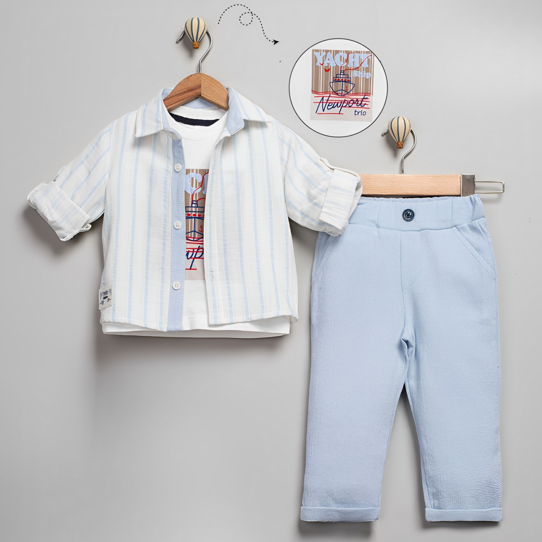 Baby boys outfit on hangers featuring a striped short-sleeve shirt layered over a graphic tee with light blue trousers.